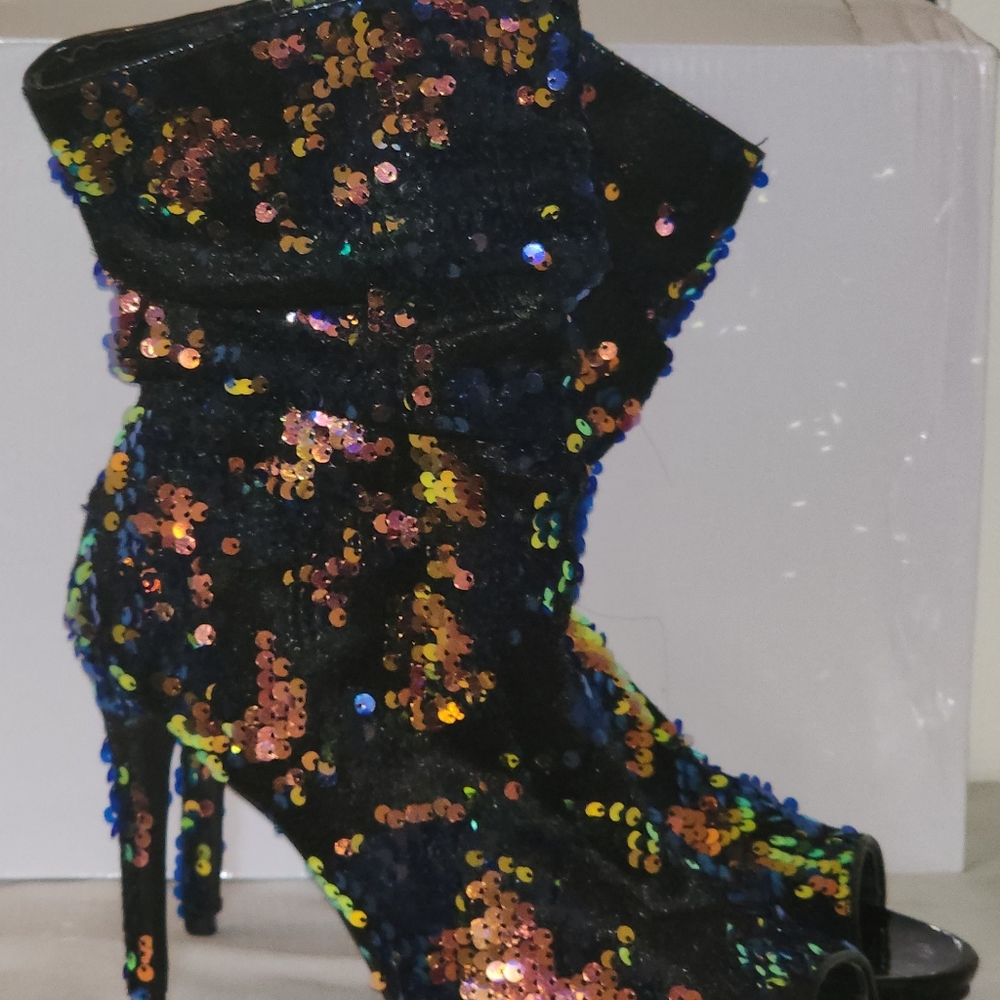 A Sequin bootie that you can dress up or down!! And they're comfortable to walk.